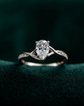 Bague Infini — diamant de laboratoire taille poire sur anneau croisé pavé, or blanc massif — Carron Olivier